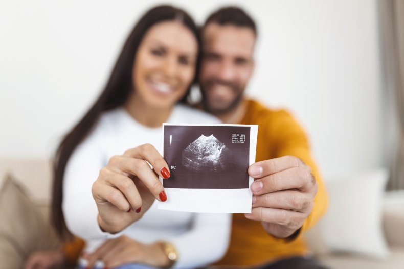 Couple announcing pregnancy