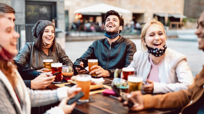 Young friends drinking beer