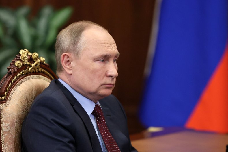 Russian President Vladimir Putin attends a meeting 