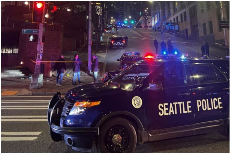 Seattle Police Department car and officers