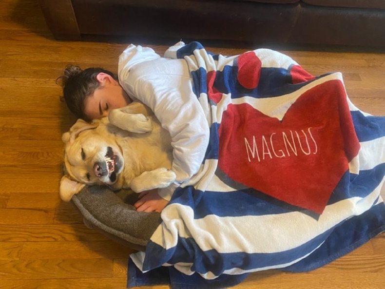 Magnus the therapy dog and his family.