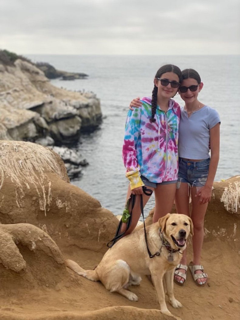 Magnus the therapy dog and his family.