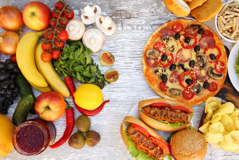 A spread of vegetables, fruits, fried foods.