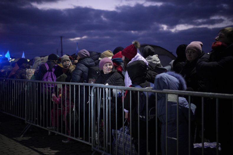 Refugees wait at Poland border