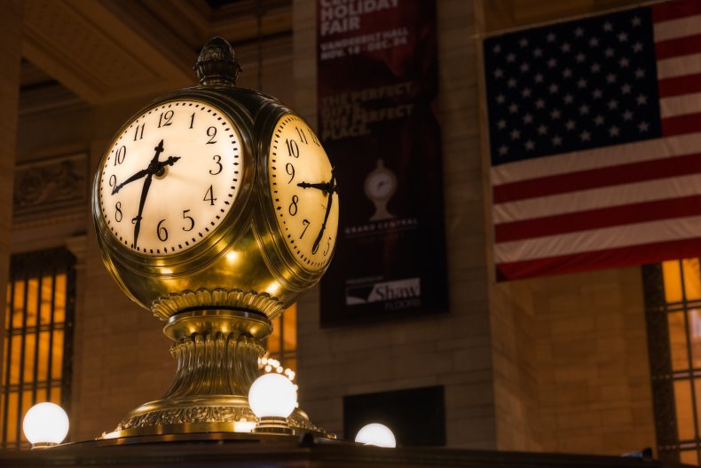 Grand Central clock near the American flag
