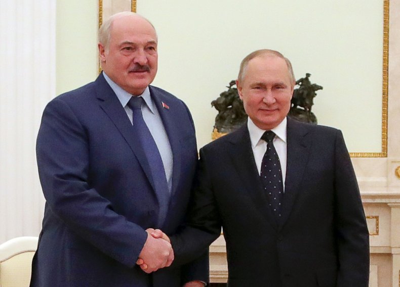 Vladimir Putin poses with Alexander Lukashenko