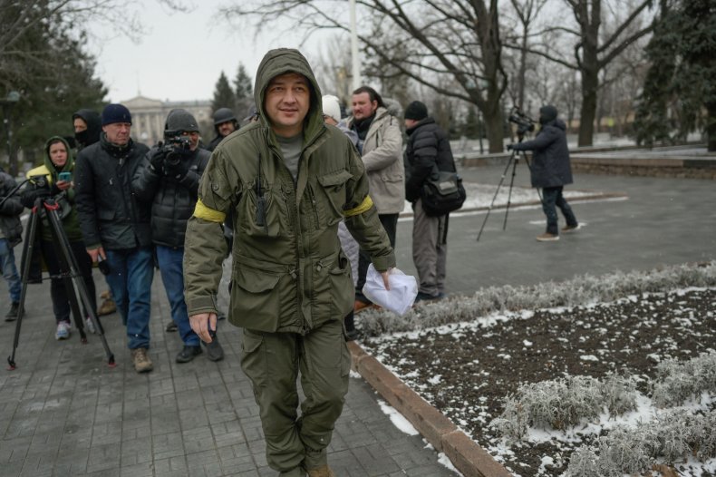 Mykolaiv Oblast Governor Vitaly Kim walks away
