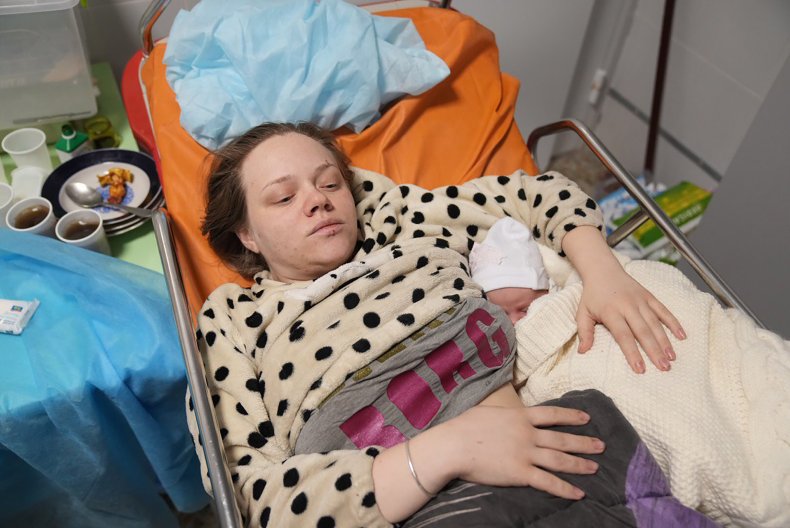Mariana with newborn