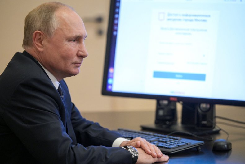 Russian President Vladimir Putin votes