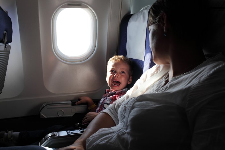 Crying toddler on plane
