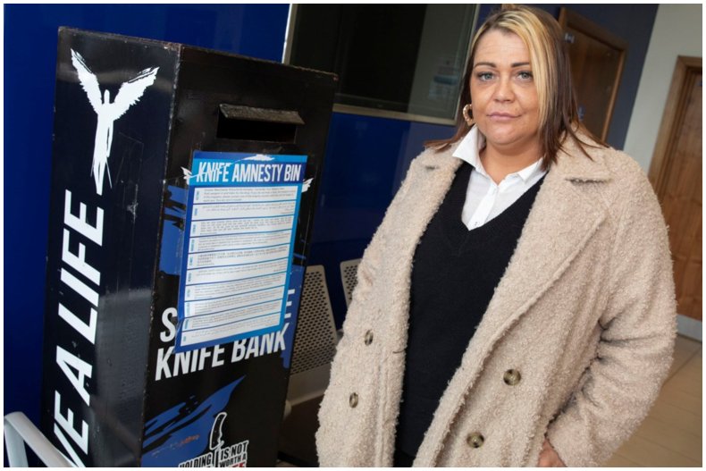 Nicola Wardle standing next to knife bin
