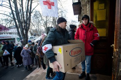 People deliver donations in Mykolaiv 