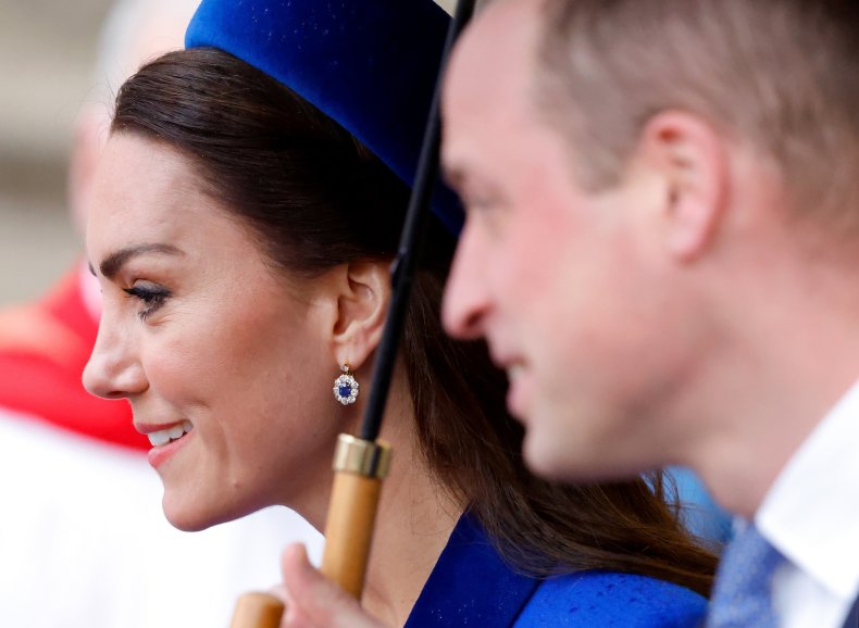 Prince William Holds Kate Middleton's Umbrella
