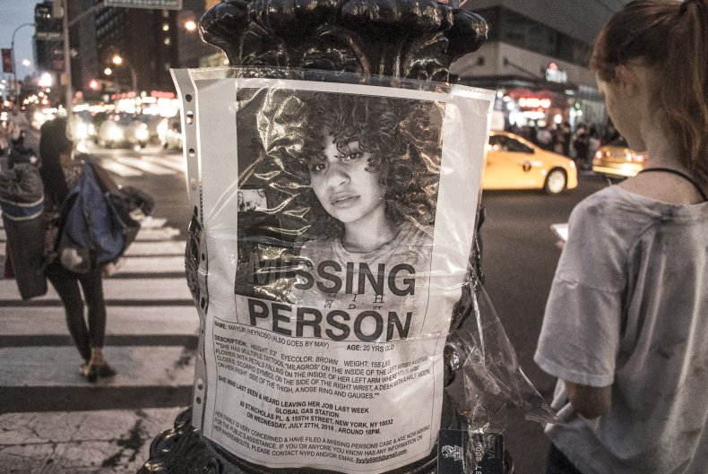 Woman's Body Found Under Pile of Clothes