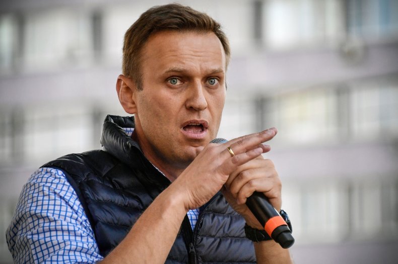 Alexei Navalny speaks into a microphone