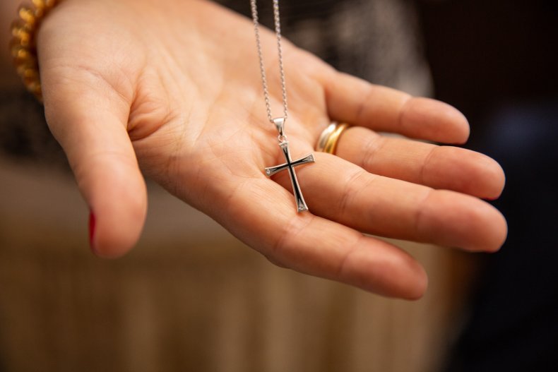 Cross in hand