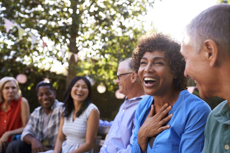 A group of friends chatting and laughing.