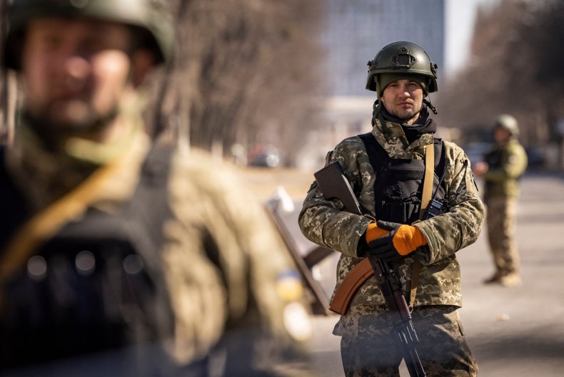 Ukraine soldiers stand guard in Kyiv invasion