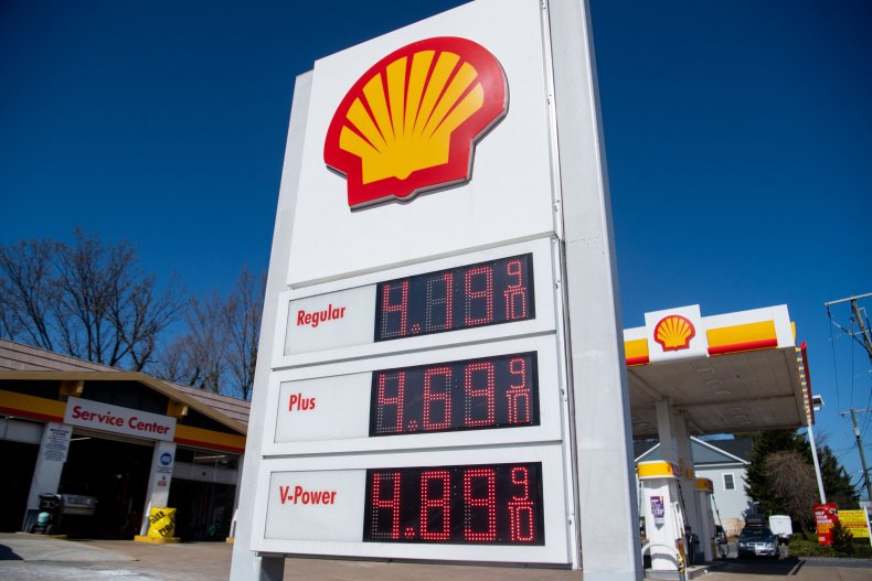 A sign displays current fuel prices