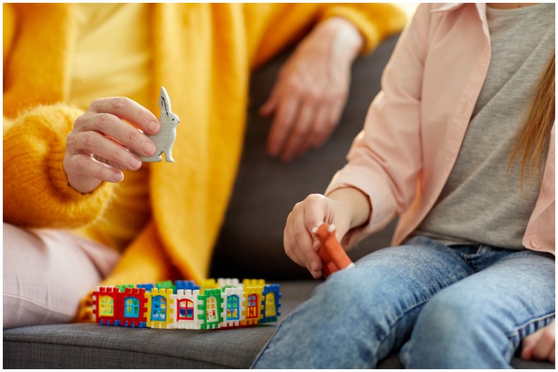 Stock image of babysitter and child
