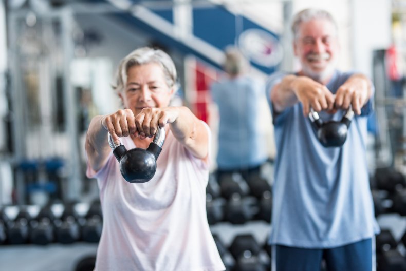 Two happy and fitess seniors doing exercise
