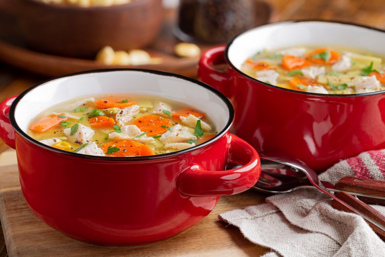 Pots of chicken noodle soup. 