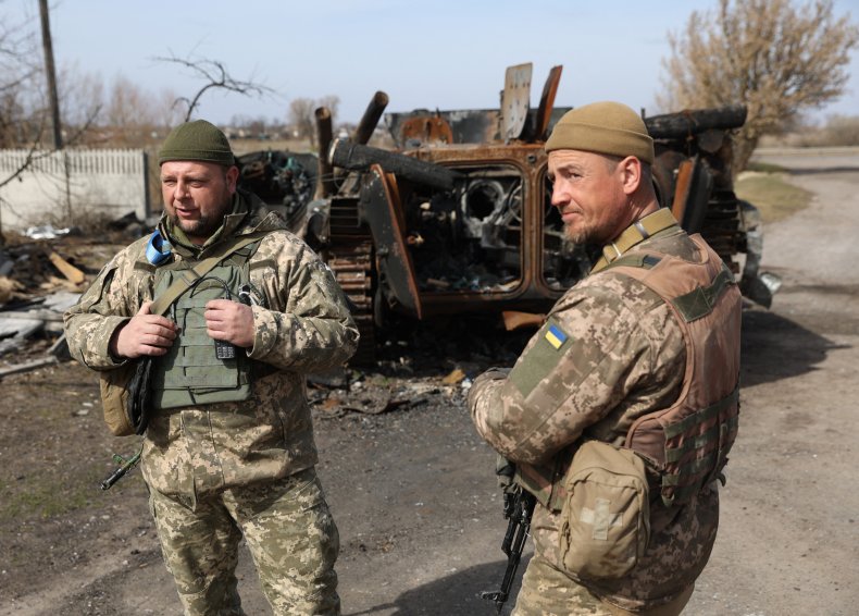 Ukraine soldiers on Kyiv frontline Russian APC
