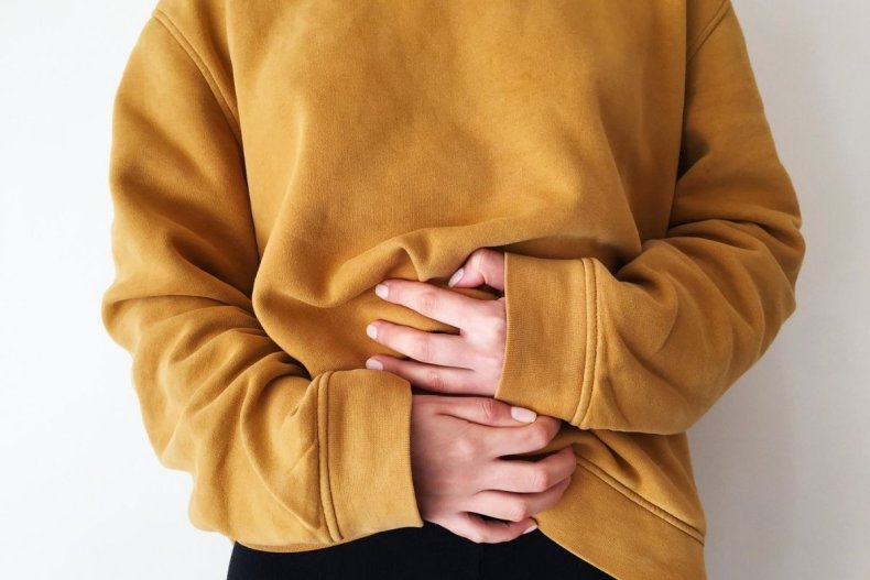 woman stomach pain cramps