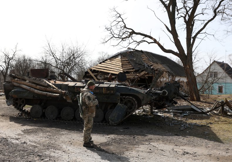 Ukraine, soldier, destroyed, Russian, APC, village, Kyiv