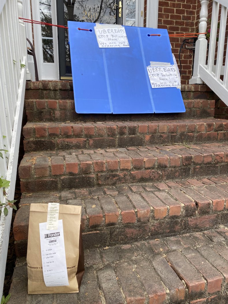 Photo of sign for Uber Eats.