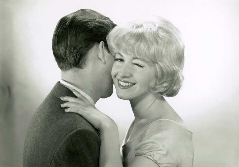 1950s Couple Dancing With Woman Winking