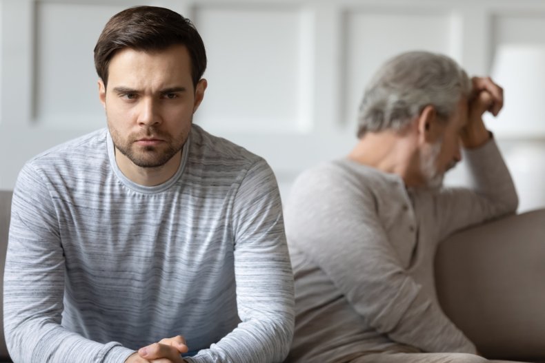 Unhappy grownup son feeling irritated after argue 