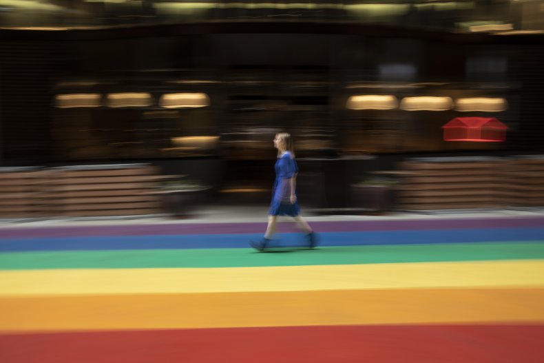 A person walks along London's Pride Walk