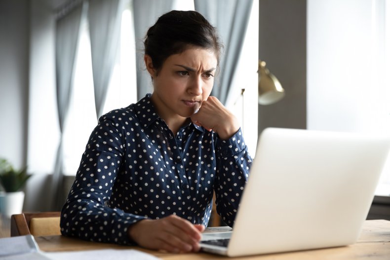 Woman reads email