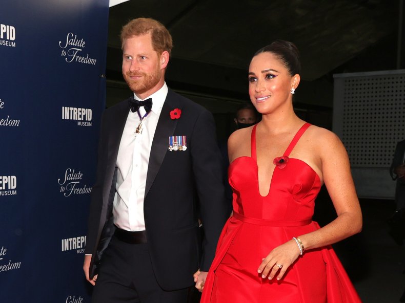 Prince Harry and Meghan Markle Salute