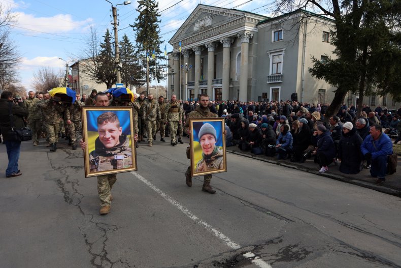 People mourn Roman and Leonid Butusin