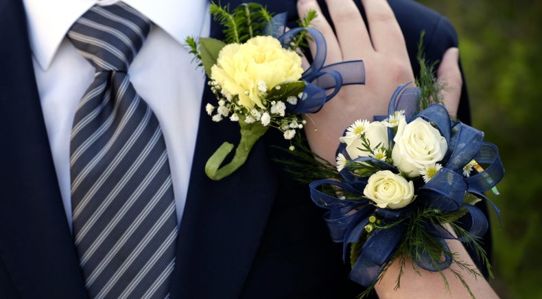 two teenagers attending prom