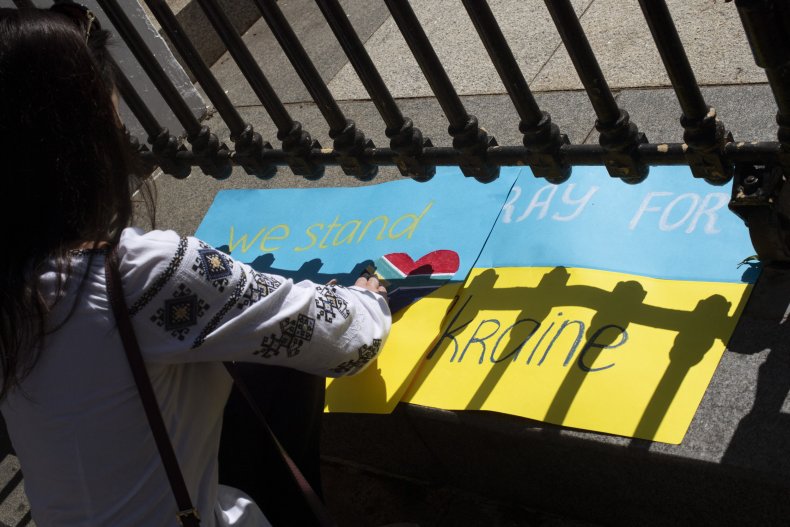 A woman makes posters