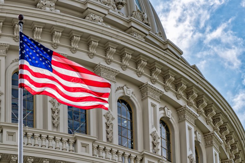 Washington DC Capitol dome and waving flag