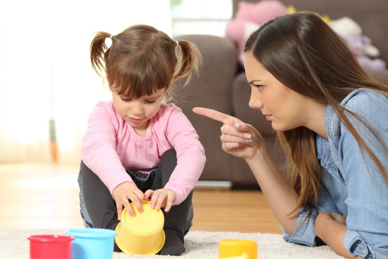 Mother disciplining her toddler