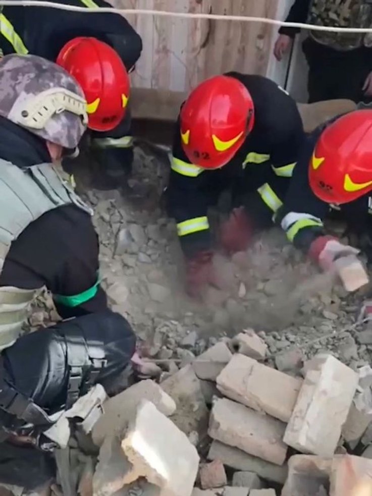 Ukrainian Cops Save Dog Buried in Rubble After Russia Shells Village