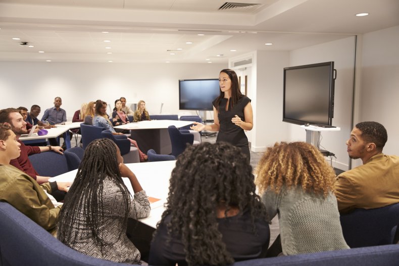 Teacher speaking to students