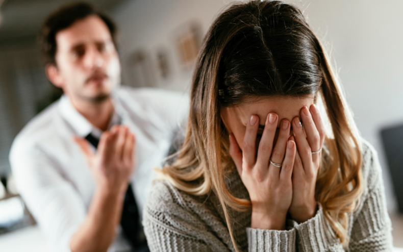 A man making a woman cry.