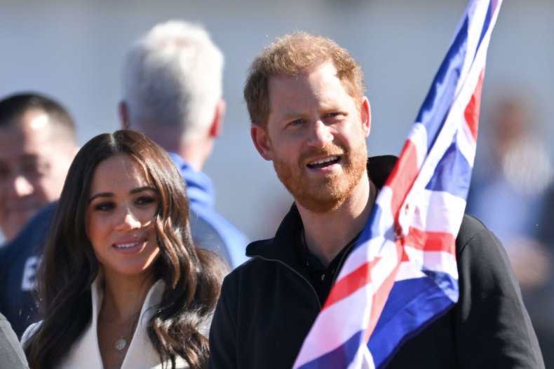 Harry Holds UK Flag Alongside Meghan