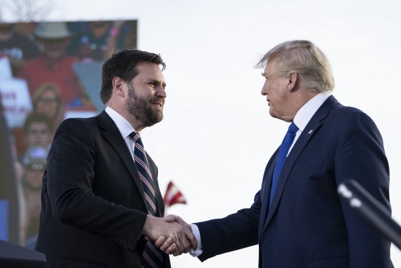 JD Vance shakes hands with Donald Trump