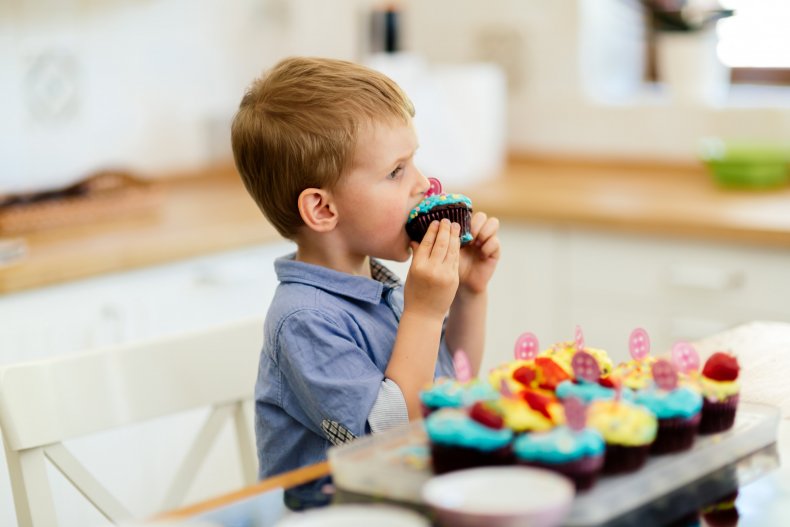 Child eating cupcake