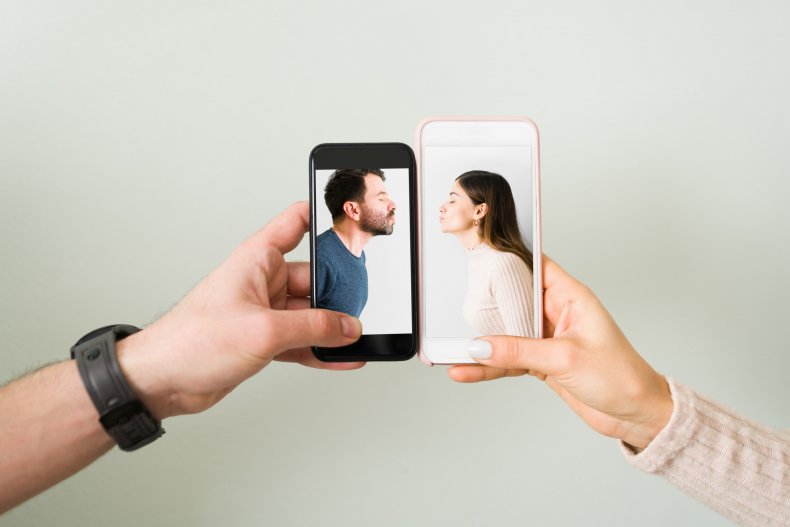 Two phones show couple posing for kiss.