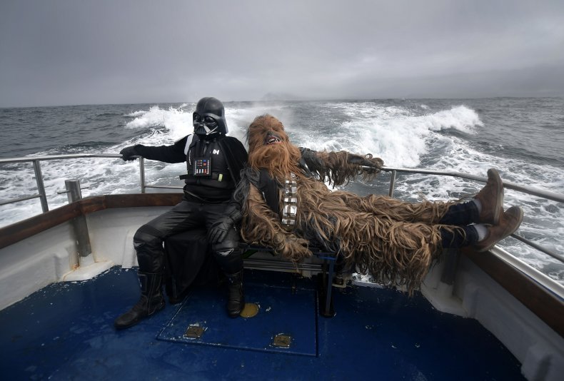 Fans dressed as Darth Vader and Chewbacca 