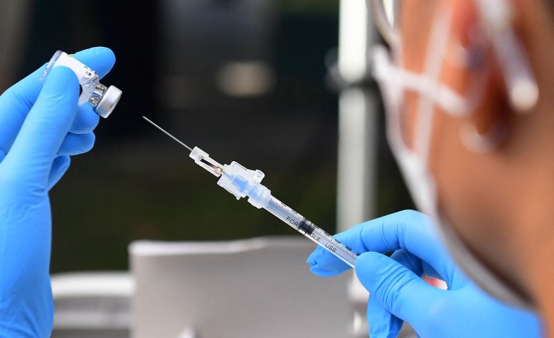 The Pfizer COVID-19 vaccine is prepared 
