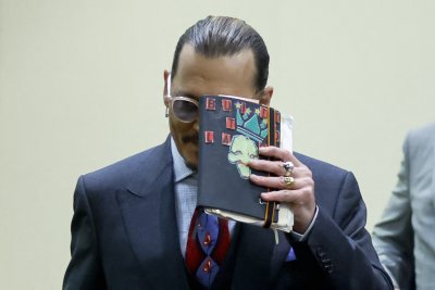 Depp walks in court Wednesday